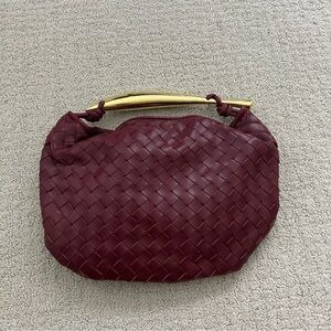 burgundy woven bag